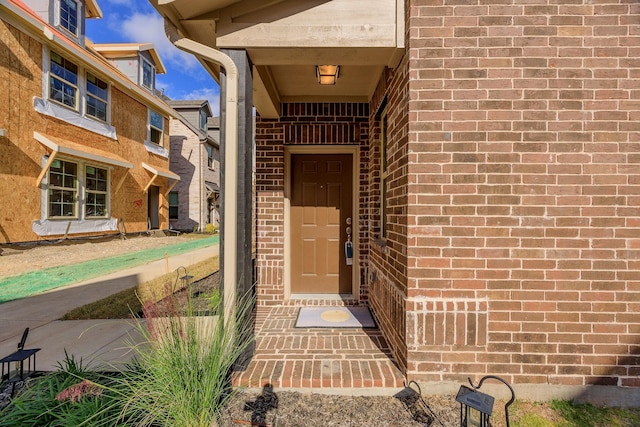 321 Baker Dr, Plano, TX 75074 - entrance to property with brick siding