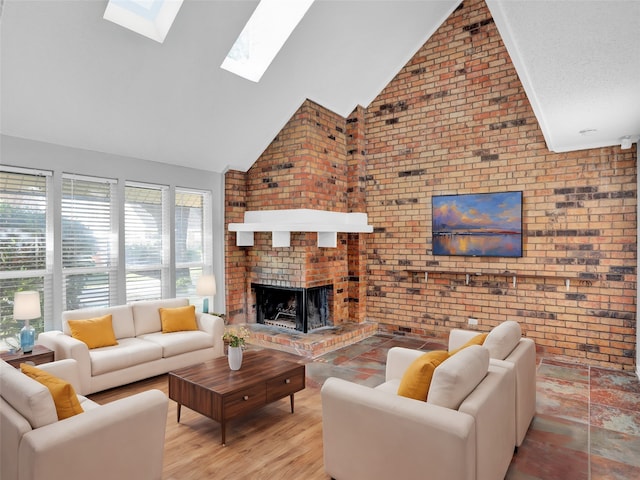 living room featuring high vaulted ceiling, light wood-type flooring, a fireplace, and brick wall