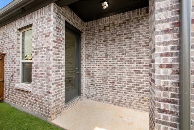 1540 Euclid Aly, Corinth, TX 76208 - view of exterior entry featuring brick siding