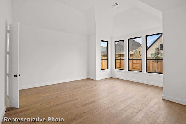 unfurnished room featuring light wood-type flooring