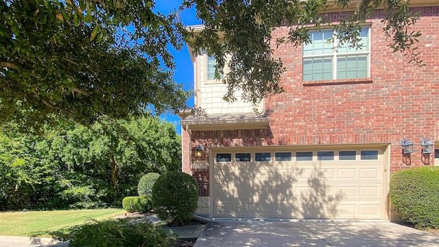 view of side of property featuring a garage