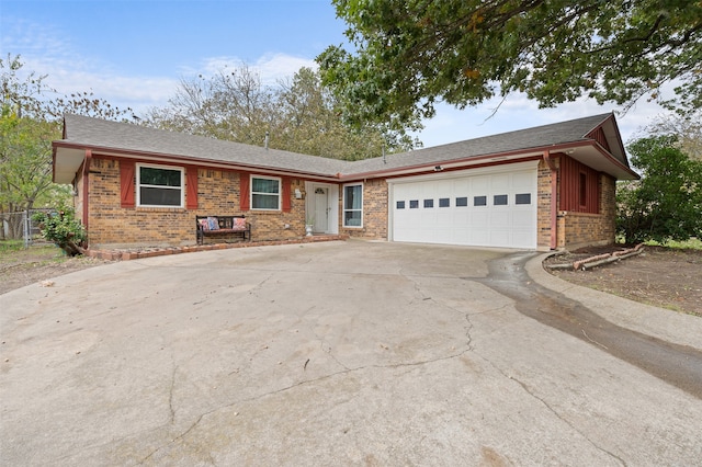 ranch-style home with a garage