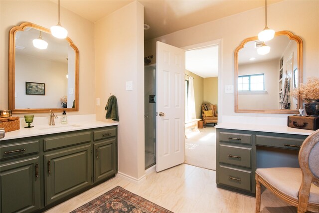 bathroom featuring vanity and a shower with door