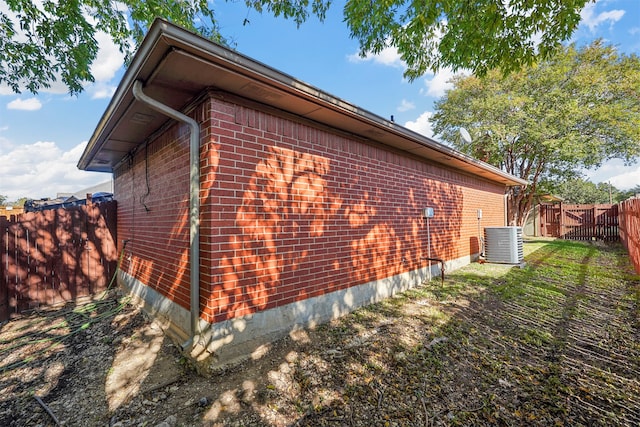 view of property exterior featuring central AC unit