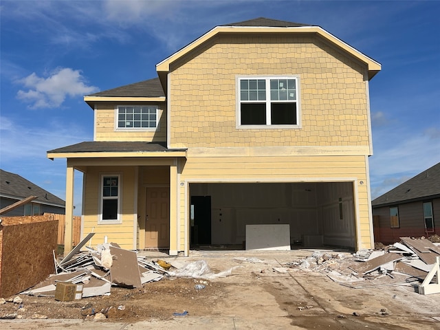 view of front of home with a garage