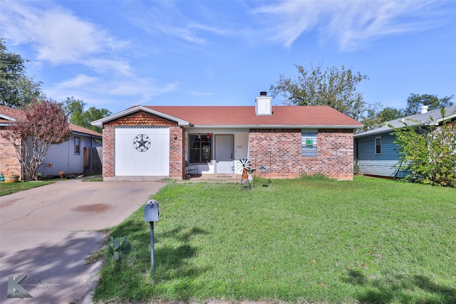 single story home featuring a front lawn and a garage