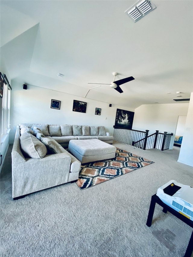 living room with carpet and ceiling fan