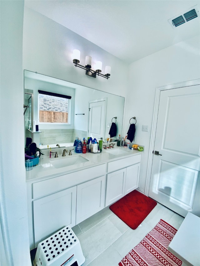 bathroom featuring vanity and tile patterned floors