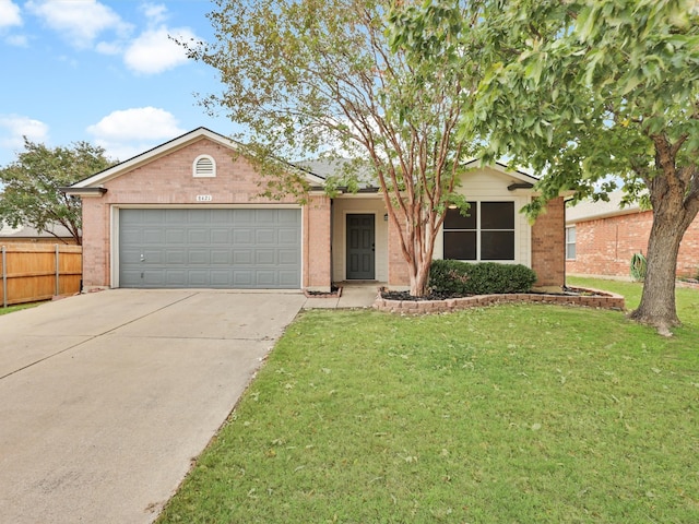 single story home with a front lawn and a garage