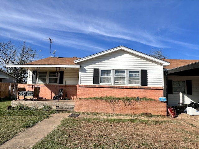 view of front of property featuring covered porch