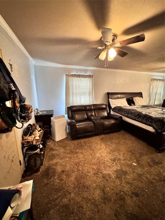 bedroom featuring carpet flooring, a textured ceiling, ceiling fan, and crown molding