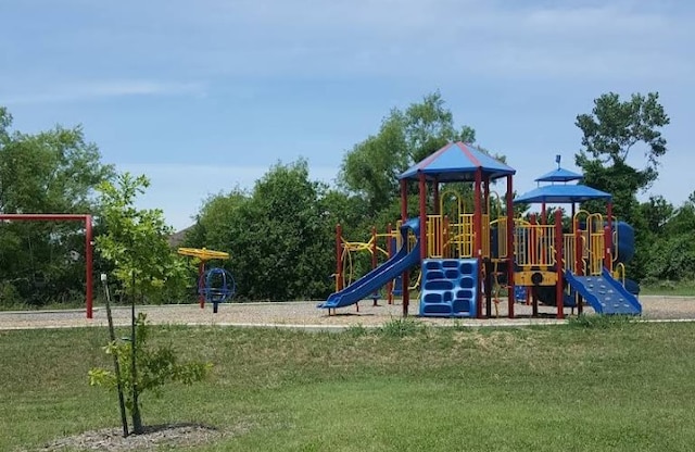 community playground featuring a yard