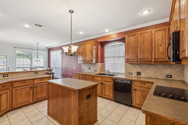 kitchen with sink, black appliances, pendant lighting, a kitchen island, and light tile patterned flooring