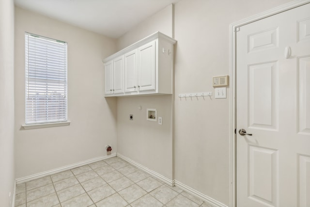 laundry area featuring electric dryer hookup, plenty of natural light, cabinets, and hookup for a washing machine