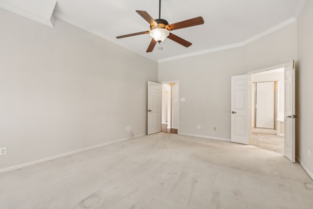 unfurnished bedroom with light colored carpet, ceiling fan, and ornamental molding