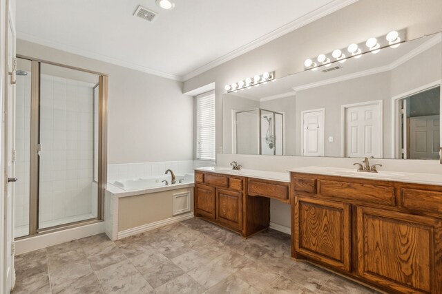 bathroom with vanity, crown molding, and shower with separate bathtub