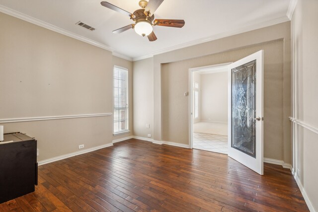 spare room with french doors, dark hardwood / wood-style floors, ceiling fan, and crown molding