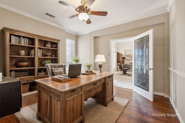 office featuring dark hardwood / wood-style floors, ceiling fan, ornamental molding, and french doors