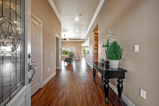 entryway with ornamental molding, ceiling fan, and dark hardwood / wood-style flooring