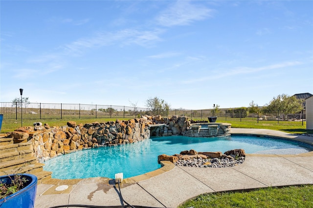 view of swimming pool featuring pool water feature and an in ground hot tub