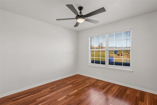 unfurnished room featuring ceiling fan and hardwood / wood-style floors