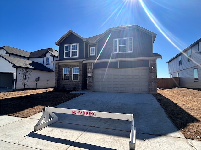 view of front of property with a garage