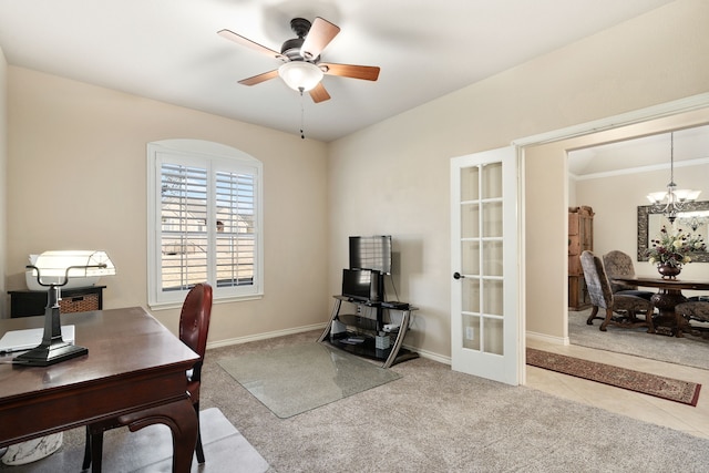 carpeted office space featuring ceiling fan with notable chandelier and french doors