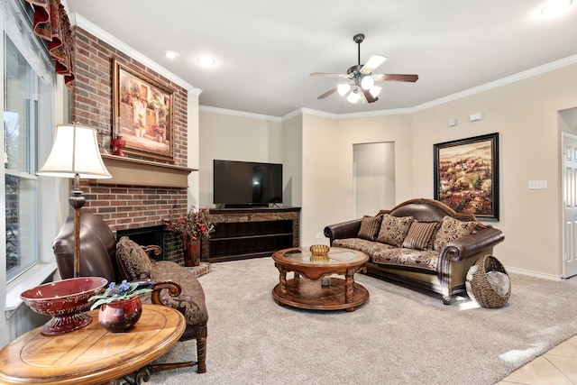 tiled living room featuring crown molding, ceiling fan, and a brick fireplace