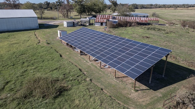 birds eye view of property with a rural view