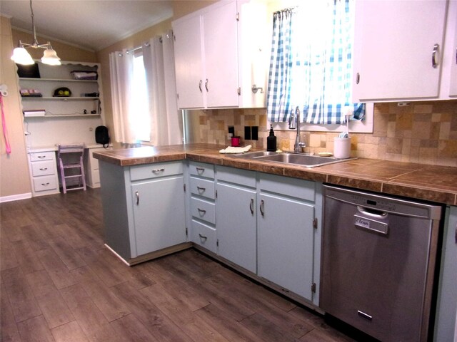 kitchen featuring white cabinetry, dishwasher, sink, hanging light fixtures, and dark hardwood / wood-style floors