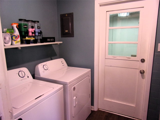 washroom with electric panel, dark hardwood / wood-style floors, and independent washer and dryer