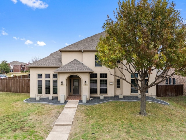 view of front of property with a front lawn