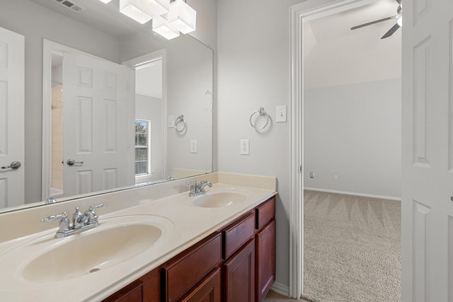 bathroom with ceiling fan and vanity