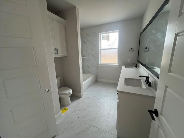 full bathroom with vanity, toilet, and tiled shower / bath