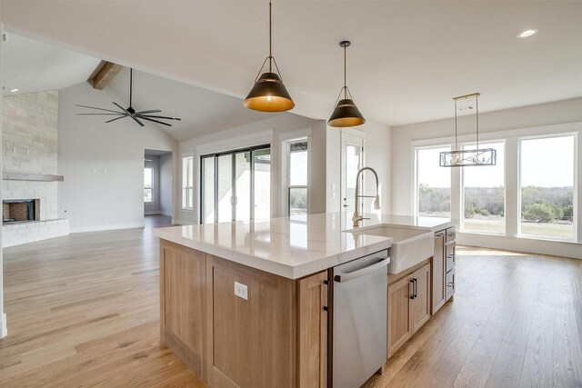 unfurnished room featuring beam ceiling and light hardwood / wood-style flooring