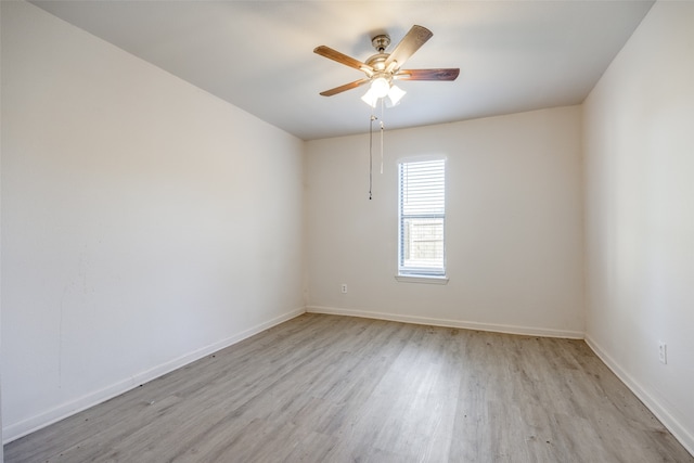 unfurnished room with ceiling fan and light hardwood / wood-style flooring