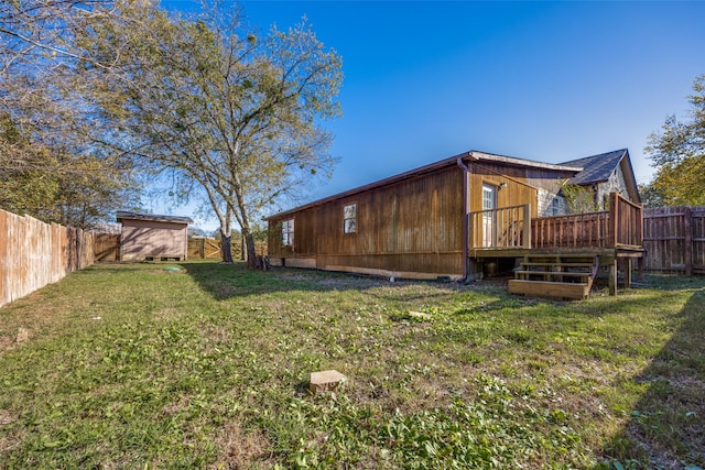 view of yard with a wooden deck