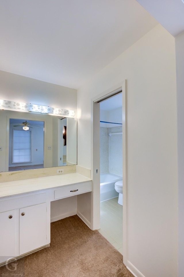 full bathroom featuring shower / bathing tub combination, vanity, toilet, and ceiling fan