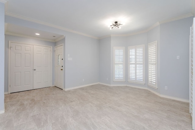 spare room featuring ornamental molding