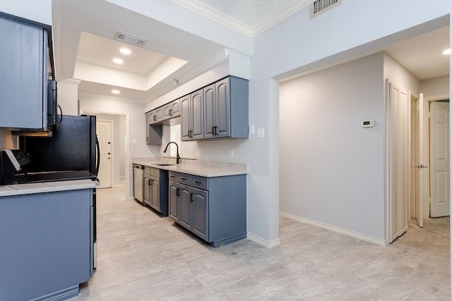 kitchen featuring gray cabinetry, dishwasher, sink, ornamental molding, and dishwashing machine