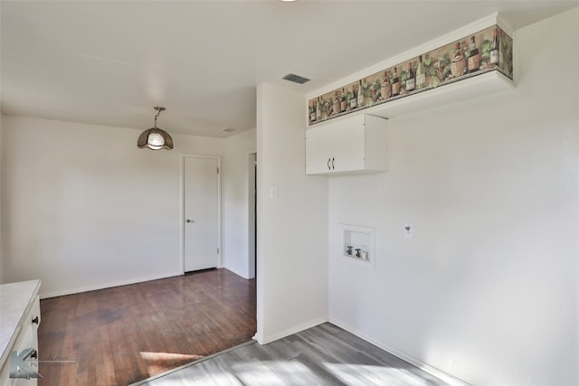 washroom featuring dark wood-type flooring