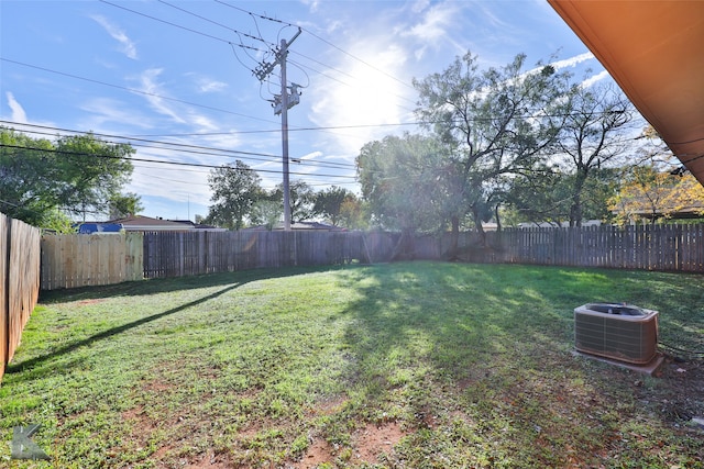 view of yard featuring central AC unit