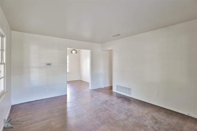 unfurnished room featuring hardwood / wood-style floors