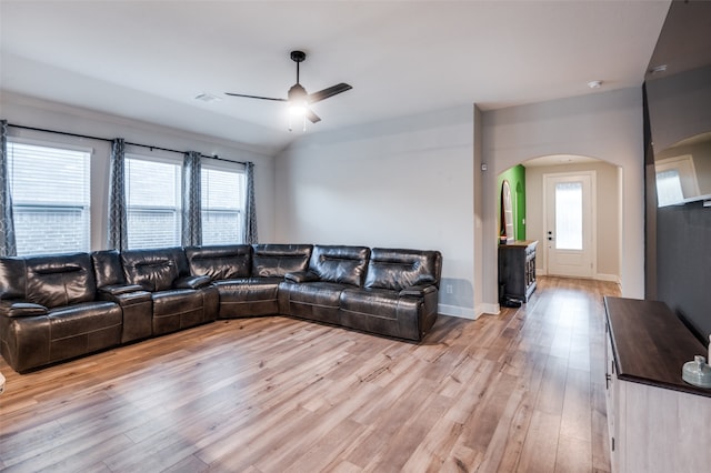 living room featuring ceiling fan, a healthy amount of sunlight, and light hardwood / wood-style flooring