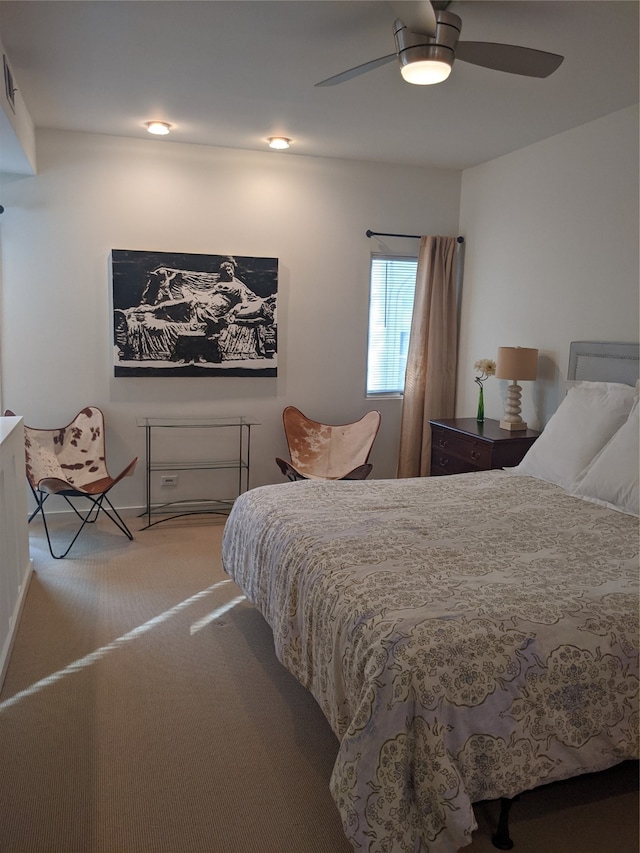 carpeted bedroom featuring ceiling fan