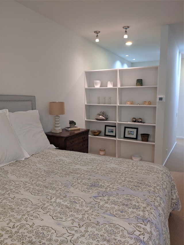 bedroom featuring lofted ceiling