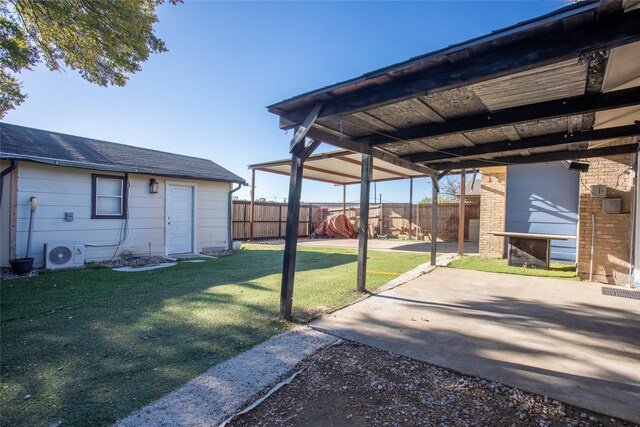 exterior space featuring ac unit and a patio area