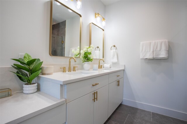 bathroom with vanity, tile patterned floors, and walk in shower