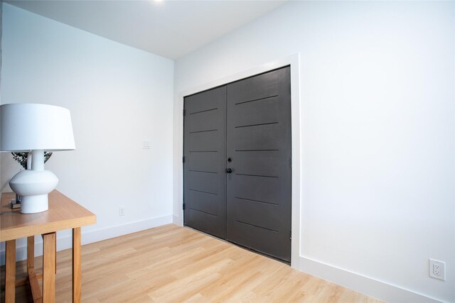 foyer with light hardwood / wood-style flooring