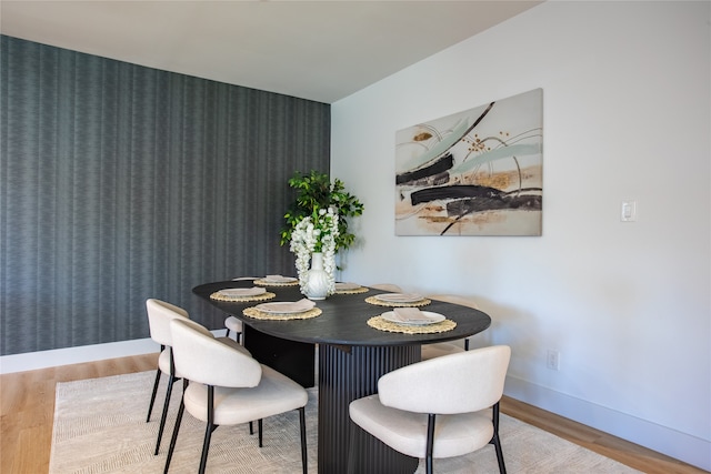 dining area featuring hardwood / wood-style flooring